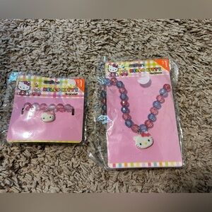 Vintage Plastic Hello Kitty Necklace and Bracelet.